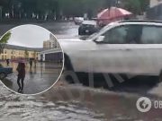 В Киеве из-за ливней произошел потоп: падали деревья, а иномарка ушла под землю. Фото, видео
