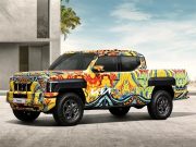 Новый пикап Kia Tasman показали в красочном камуфляже